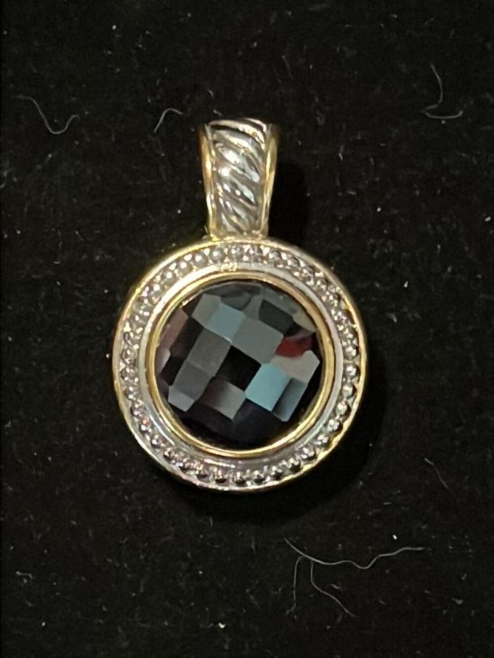 Round Smoky Faceted Stone with Gold and Silver Tone Frame Pendant